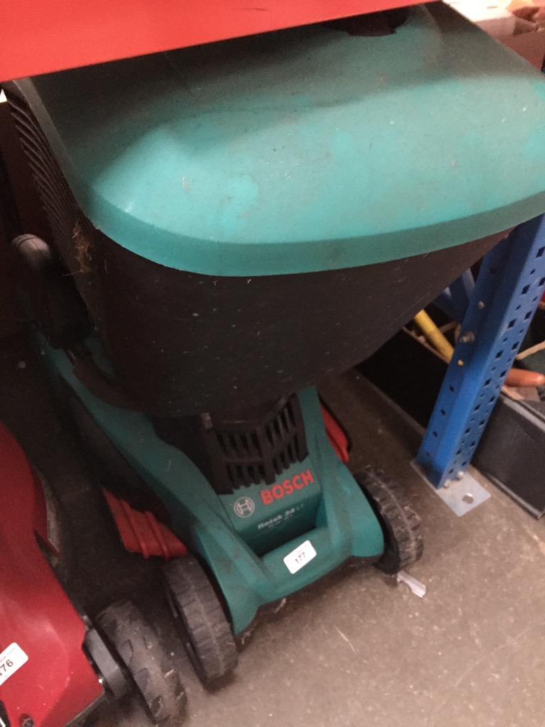 A cordless Bosch Rotak 34 lawn mower - no charger.