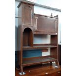 An Arts & Crafts oak bureau bookcase.