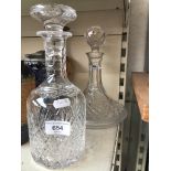 An Edinburgh crystal ship's decanter and another cut glass decanter.