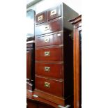 A reproduction mahogany campaign style chest of drawers.