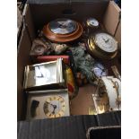 A box of clocks and barometers.