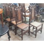 A set of four carved oak chairs with cane seats and twist supports.