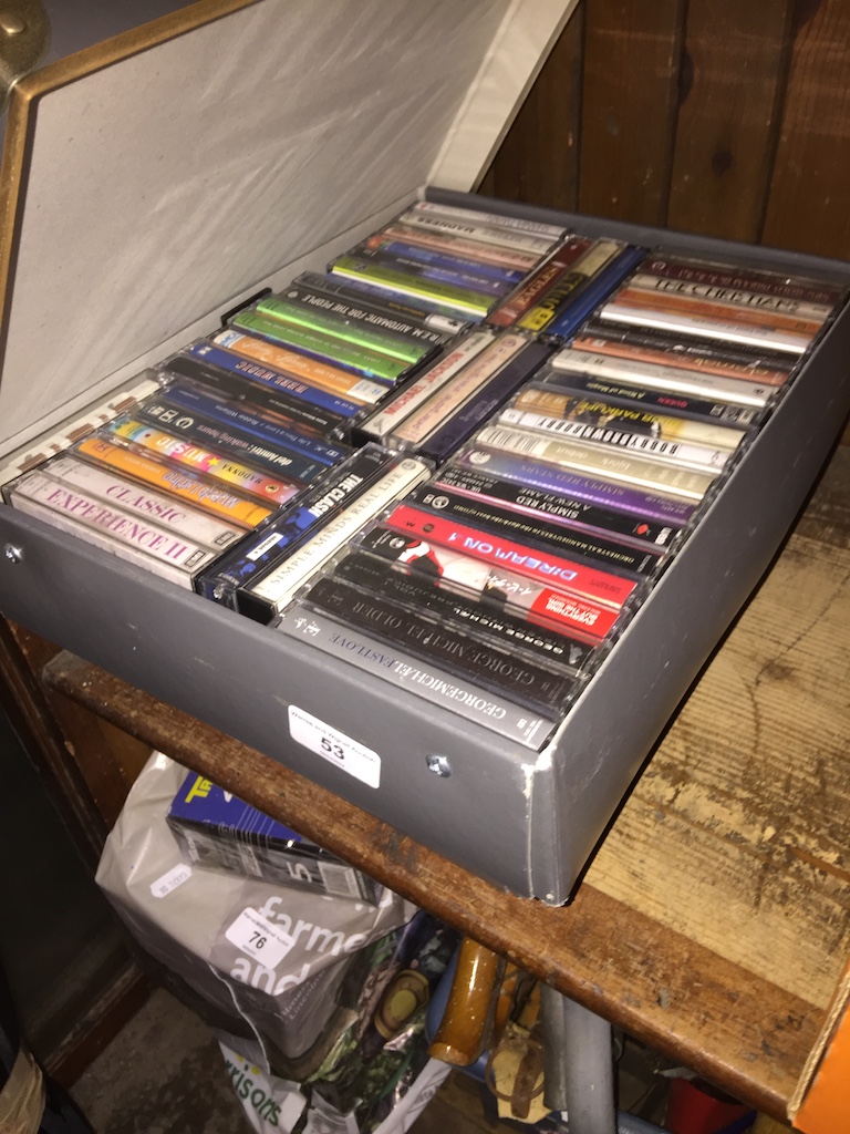 2 cases of music cassettes