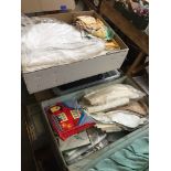 A large box of linen etc and a suitcase containing linen and crochet work