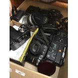 A box of cameras and accessories to include Minolta 404si, Panasonic DMC-FZ18, Sankyo EM-30XL cine