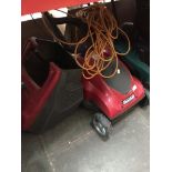 An electric Mountfield lawn mower.