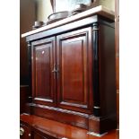 A reproduction mahogany and marble top chiffonier sideboard.