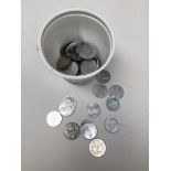 A tub of collectors tokens including cars, issued by Shell, World Cup 1970 by Esso, and FA cup