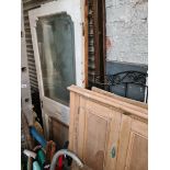 Wooden doors panels, a wrought iron folding garden shelving and white painted doors etc.