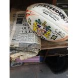 A signed Wigan RLFC rugby ball and a number of vintage copies of Lancashire Evening Post