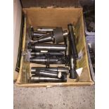 A box of 10 milling cutters with carbide inserts, various types and sizes.