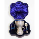A matched four piece silver sugar and cream set, the sugar and cream decorated with the signs of the