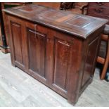 An oak blanket chest with key