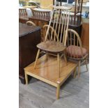 A modern Ercol light elm coffee table and a single Ercol elm seated spindle back chair. Some