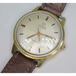 A 1966 gold plated Omega Seamaster, ref. 166.002, cal. 565, serial number 24280718, signed champagne