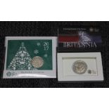A Royal Mint one oz silver Britannia and a 2017 Christmas £5 coin.