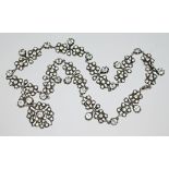 A 19th century French style paste set necklace, length 42cm, white metal unmarked, gross wt. 63.69g.