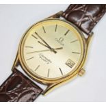 A 1980s gold plated Omega Seamaster Quartz, the gold coloured round dial having gold markers, gold