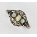 An antique precious opal and diamond cluster ring, the cluster measuring approx. 10.78mm x 10.09mm