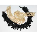 A Victorian jet choker necklace length 32cm, together with a simulated pearl choker necklace.