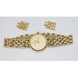 A 9ct gold Accurist wristwatch with 9ct gold strap and two spare links, gross wt. 20.52g.