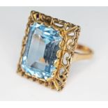 A hallmarked 9ct gold ring set with a synthetic spinel, gross wt. 7.82g, size L. Condition - good,
