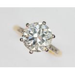 A diamond solitaire ring, the six claw set early round brilliant cut stone weighing approx. 2.52