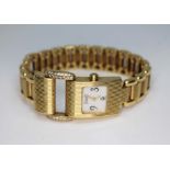 A ladies 18ct gold and diamond set Piaget Miss Protocole wristwatch, gross wt. 77.40g.