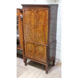 An early 20th century mahogany cabinet by Waring & Gillow, width 70cm, depth 46cm & height 155cm.