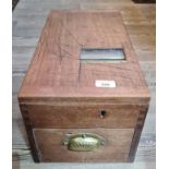 A vintage cash box labelled 'G.H. Gledhill & Sons'.