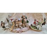 Three vintage Capodimonte figural groups; a young couple, musicians and a small soldier.