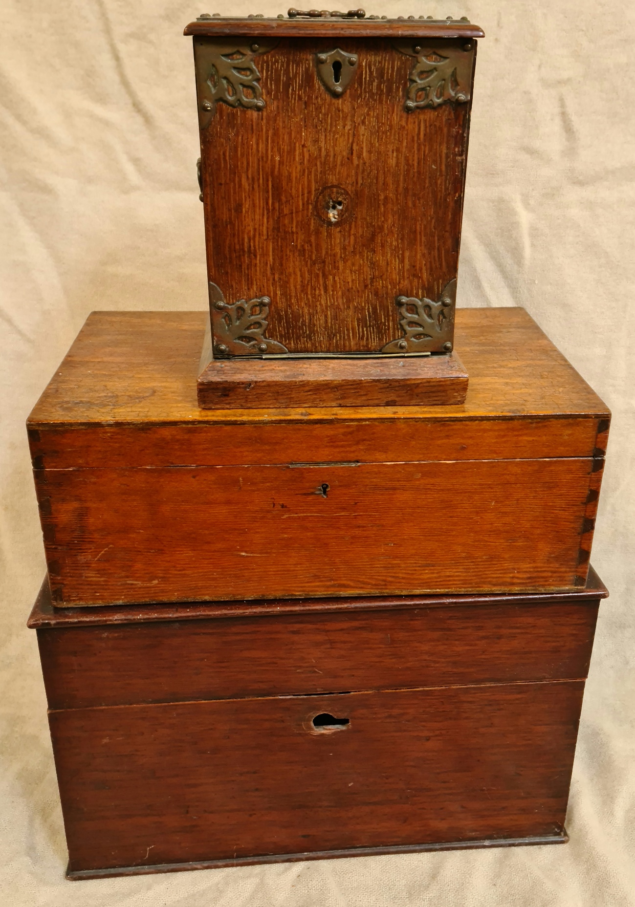 A wooden chest with hidden mini drawers, a wooden box and a wooden desk tidy.