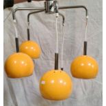 A retro mid 20th century light fitting with 5 shades