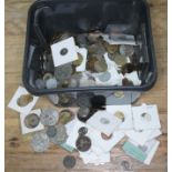 A tub of world coins.