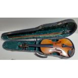 An antique violin, two piece back length 360mm, with bow and hard case.
