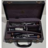 A vintage wooden Regent Boosey and Hawkes clarinet in original case.
