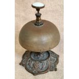 A vintage brass desk bell.