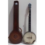 A vintage banjo in leather case, marked Richard Spencer Clapham. Condition:- General wear through
