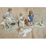 Five porcelain figures comprising two Nao, one Lladro and one Royal Copenhagen.