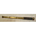 An antique 4 drawer brass telescope.