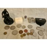 A box of collectables to include antique plated coin holder with various coins, a leather coin