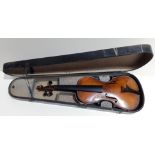 An antique violin, two piece back length 335mm, with wooden case.