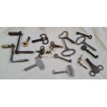 A bag of antique and vintage clock keys and cabinet keys.