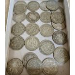 A collection of 23 pre WWII half crowns, gross weight 317.20g.