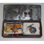 An old tin box "Tim Bobbin" containing China War medal 1900 awarded to H. Holt, Sto. HMS Arethusa, a