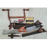 A box of old saws etc.