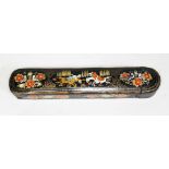 An antique Persian/Qajar Islamic Qalamdam pen box with horse riders, birds and floral decoration.