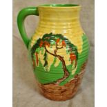 An Art Deco Clarice Cliff style pottery jug by Wilkinsons decorated in Memory Lane pattern.