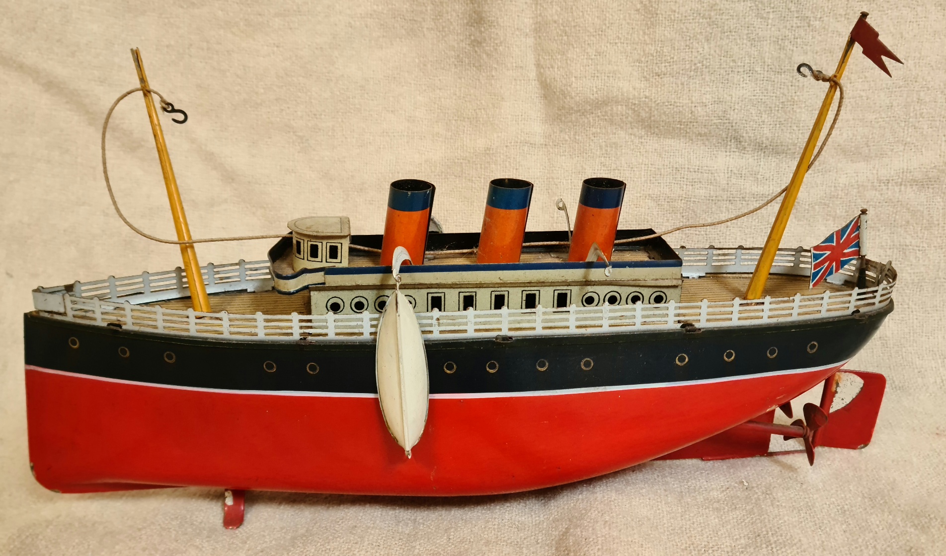 A vintage Litho tin ship.