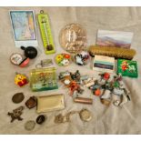 A box of collectables and militaria to include paperweights, WWI medal awarded to Pte. D.